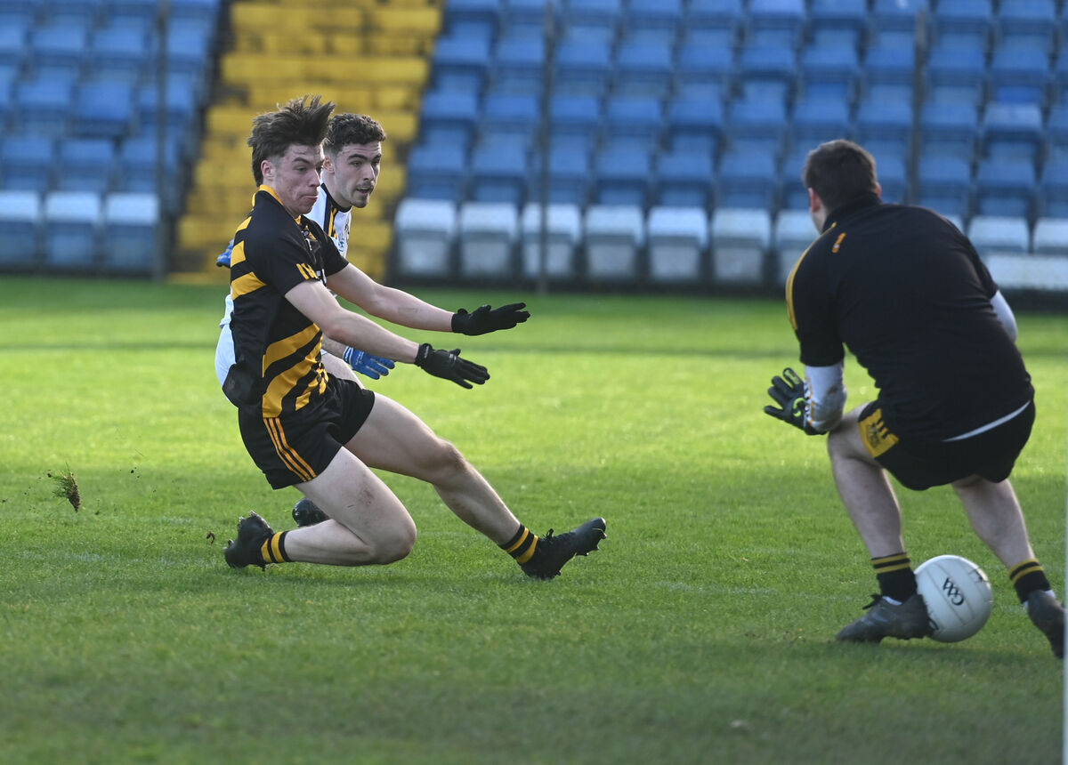  Goalkeeper Trevor McAuliffe, Castlemagner makes a fine save from a close-range shot by Darragh McMahon, Canovee. Picture: Larry Cummins