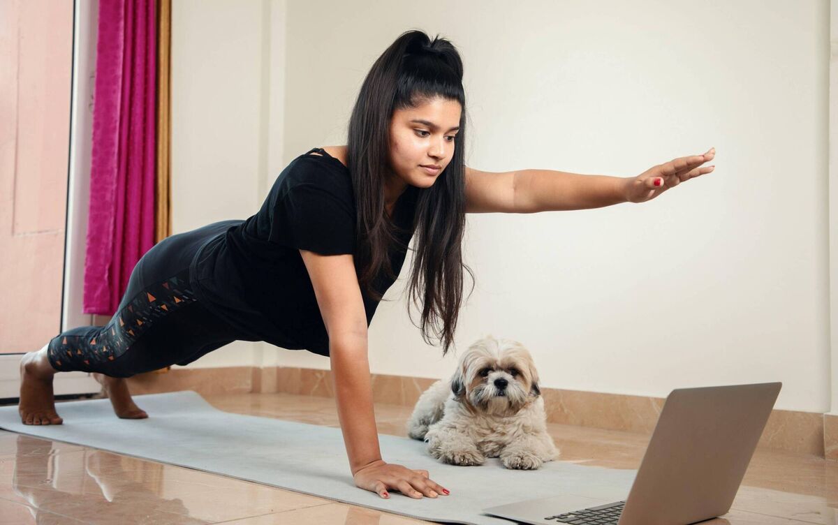 Ali Malik personal trailer suggests doing circuits including a squate, press-up, planks and repeat. Picture: Stock posed by model