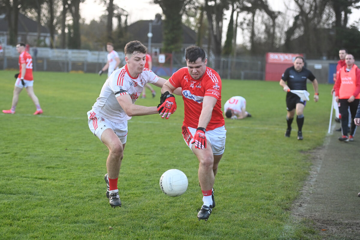 Mayfield's Daniel Lucey is tackled by Stephen Fenton, Ballygarvan, in the County JAFC semi-final at Páirc Uí Rinn. Picture: Larry Cummins Mayfield's Daniel Lucey is tackled by Stephen Fenton, Ballygarvan, in the County JAFC semi-final at Páirc Uí Rinn. Picture: Larry Cummins