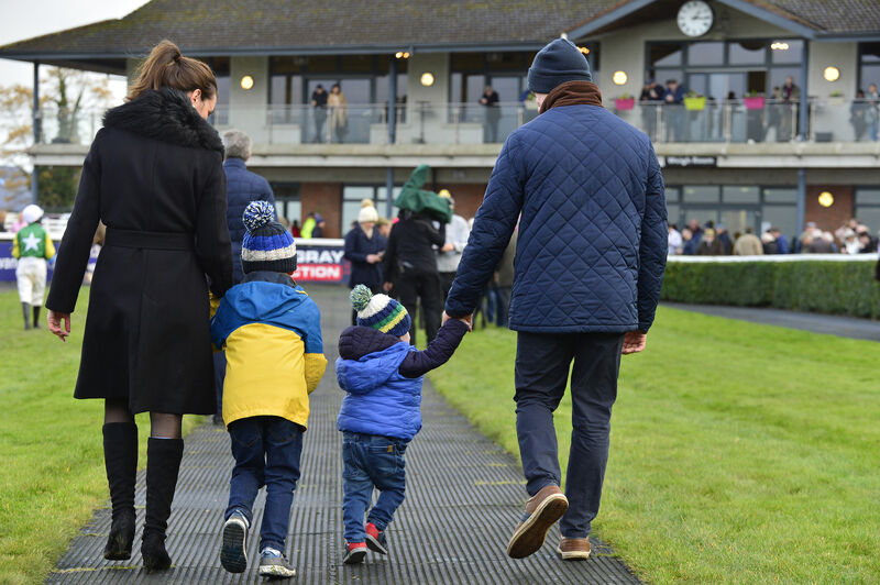 Jockey Denis O'Regan with wife Louise and kids Thomas and Charles after he announced his retirement from the saddle. Picture: Healy Racing