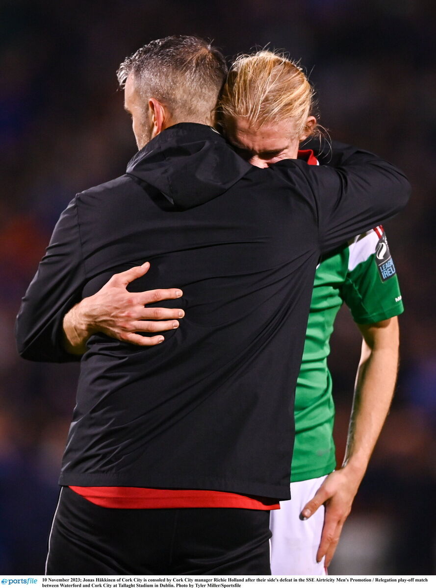 Jonas Häkkinen of Cork City is consoled by Cork City manager Richie Holland after relegation. Picture: Tyler Miller/Sportsfile