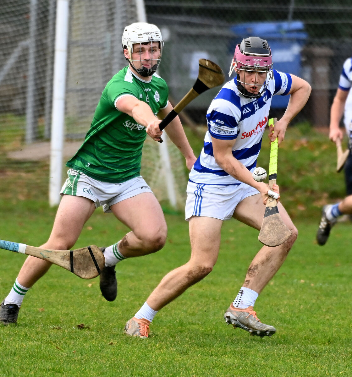 Inniscarrra's Sean Lenihan gathers the ball from Ballincollig's David O'Sullivan. Picture: Eddie O'Hare Inniscarrra's Sean Lenihan gathers the ball from Ballincollig's David O'Sullivan. Picture: Eddie O'Hare