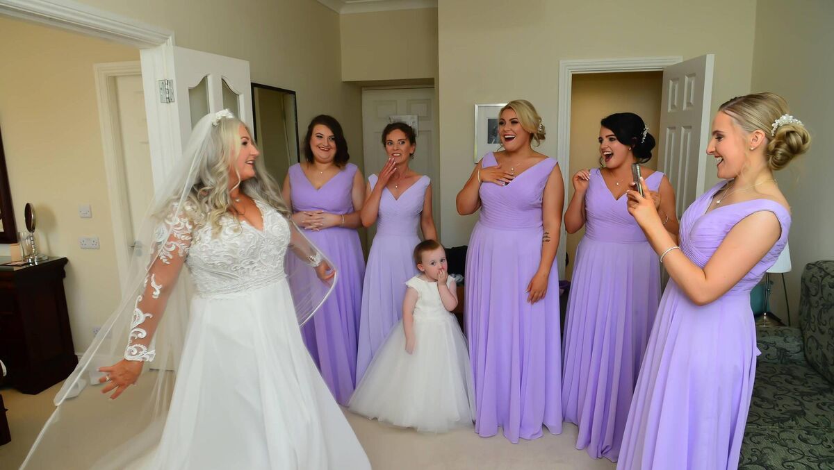 The bridal party included bridesmaids Yvonne Harrington (best friend, maid of honour), Sarah Hughes (bride’s daughter, chief bridesmaid) Annmarie Cronin (John’s daughter), Megan Walsh (bride’s daughter, bridesmaid) and Aisling Minihane (bride’s niece , bridesmaid).