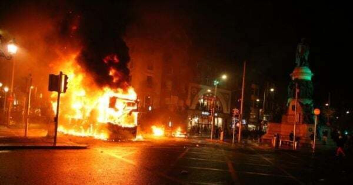 Shops looted, Luas and Dublin Bus set alight as 'hooligans' clash with gardaí - Vimarsana News