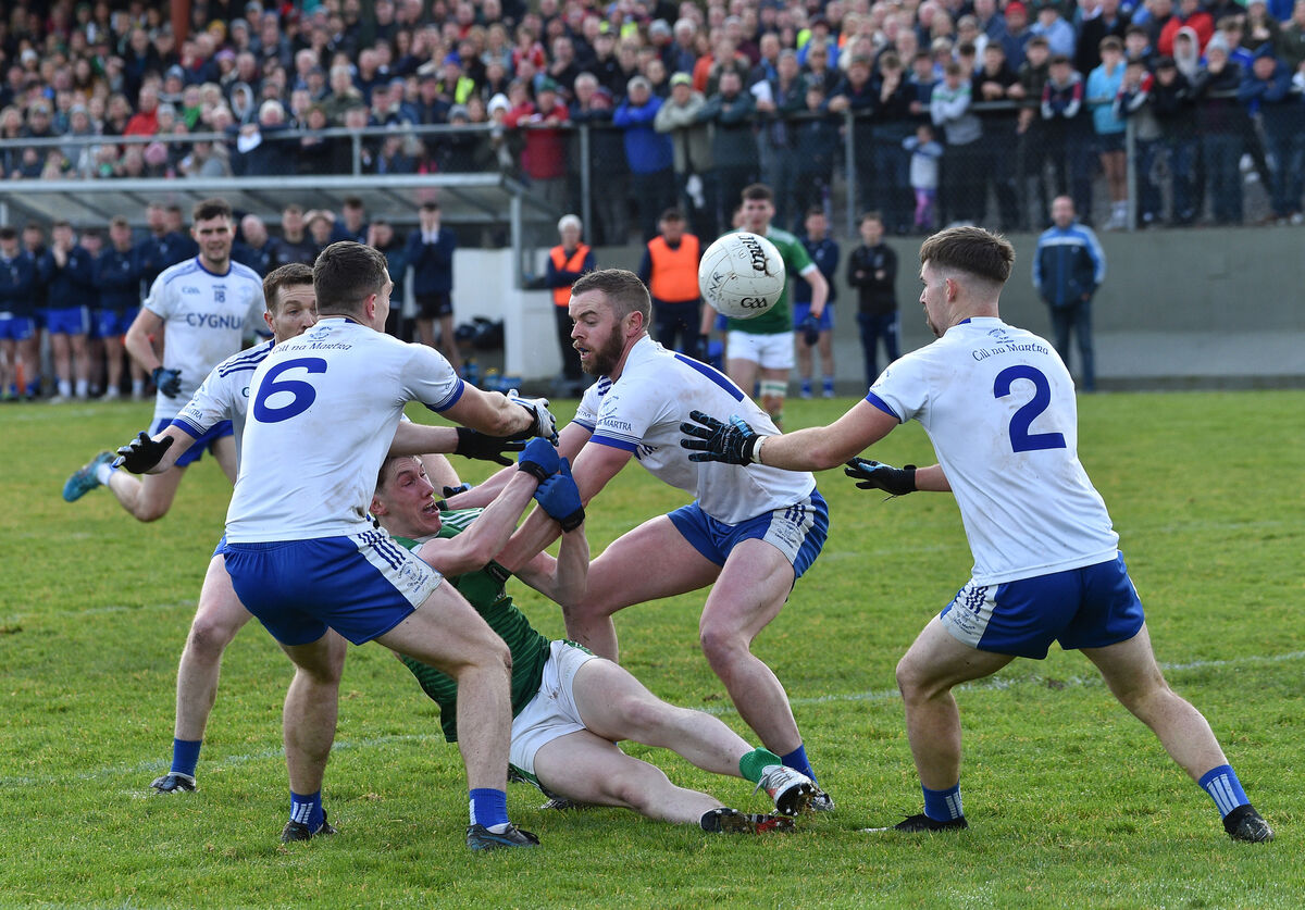  Cill Na Martra players Seán Ó Fóirréidh, Fionbarra Ó h-Éalaithe and Colm Mac Lochiainn suround Cillian Burke, Miltown during their AIB Munster GAA Club Intermediate football championship semi-final match at Cill na Martra, Co Cork. Picture Dan Linehan