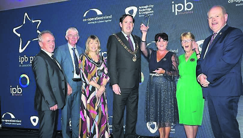 The Lord Mayor, Margaret Tinsley and chairperson Tom Dowling present the Pride of Place Urban Neighbourhoods Over 3,000 trophy to Ballyphehane, Cork city. The Lord Mayor, Margaret Tinsley and chairperson Tom Dowling present the Pride of Place Urban Neighbourhoods Over 3,000 trophy to Ballyphehane, Cork city.