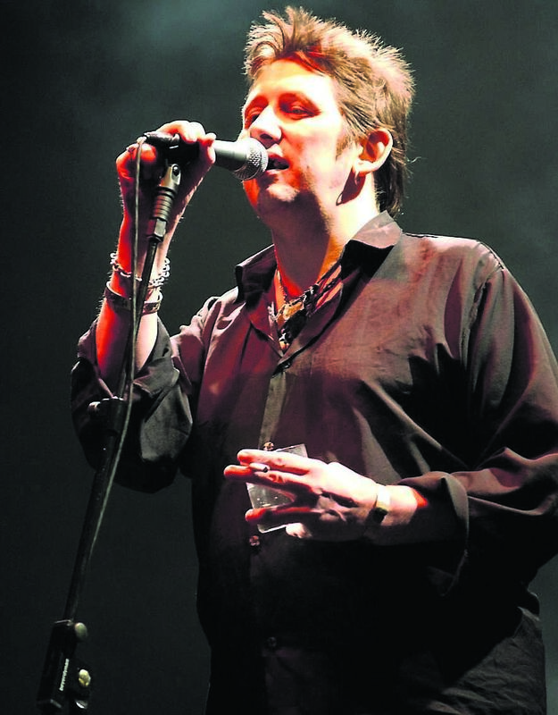 Shane McGowan performing live on stage at the Fleadh 2002 Music festival, Finsbury Park, North London.