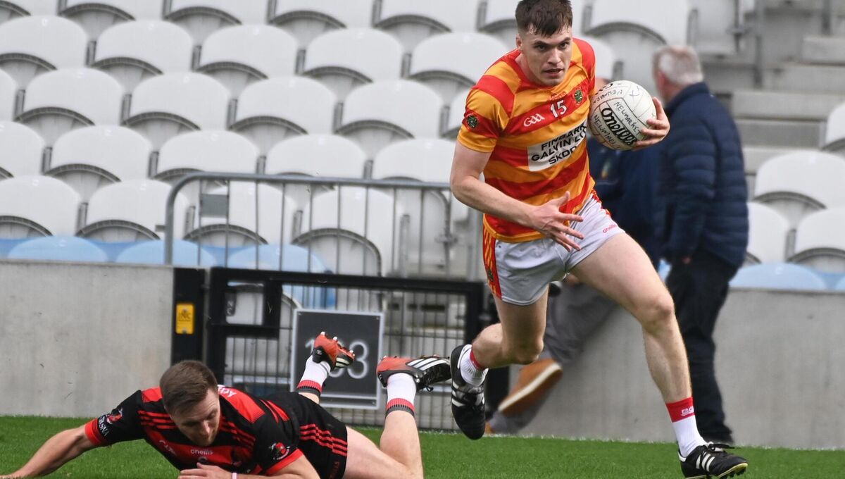 Newcestown's David Buckley goes past Newmarket's TJ Brosnan during the 2023 SAFC semi-final at Páirc Uí Chaoimh. Picture: Eddie O'Hare