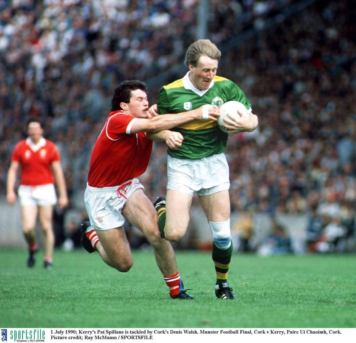 Denis Walsh challenges Pat Spillane in the 1990 Munster SFC final at Páirc Uí Chaoimh. Picture: Ray McManus/Sportsfile
