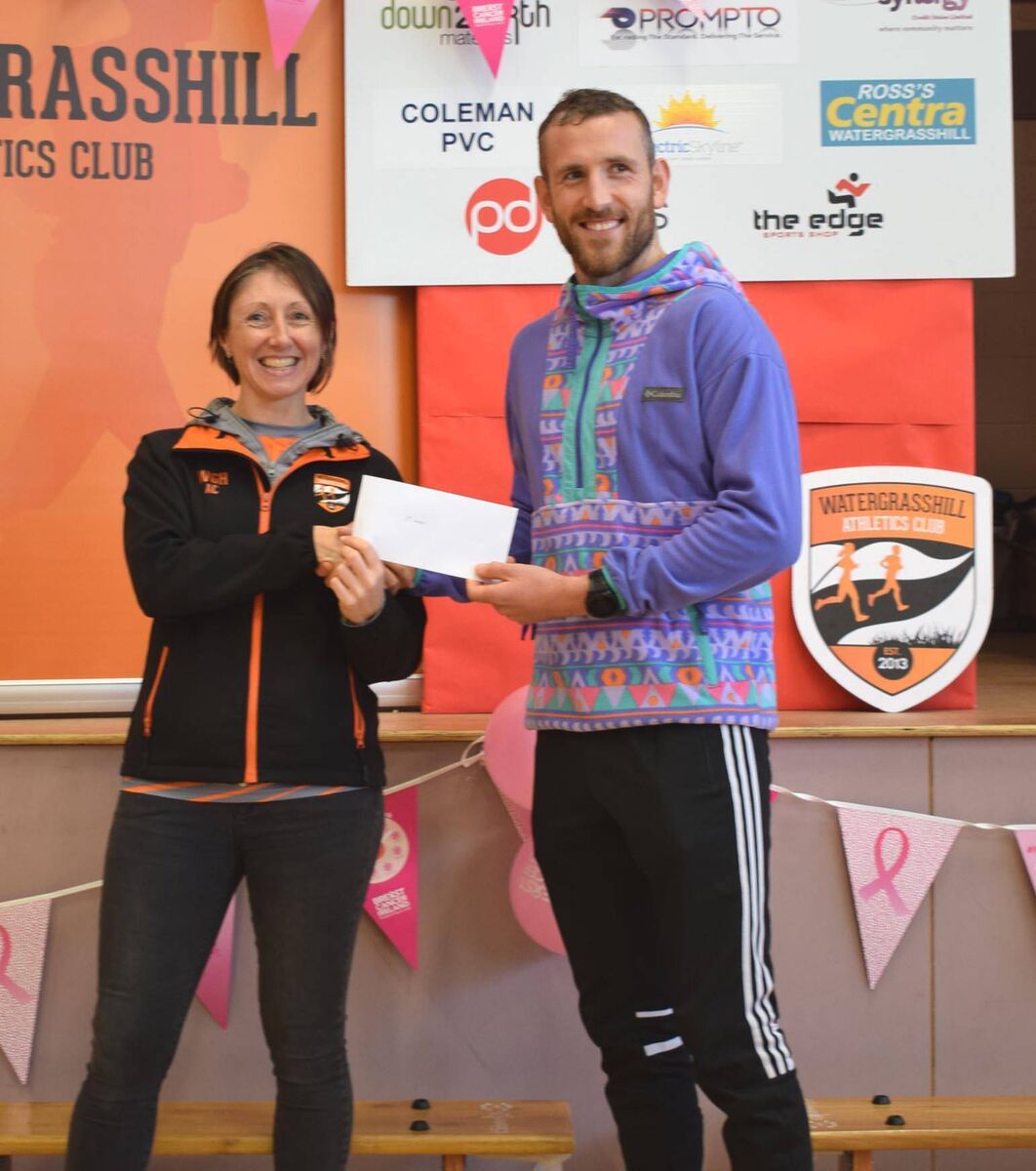 Denis Hegarty, winner of the Great Glenville Run, receiving his prize from Colette O'Donoghue, Chairperson of Watergrasshill AC. Picture: John Walshe Denis Hegarty, winner of the Great Glenville Run, receiving his prize from Colette O'Donoghue, Chairperson of Watergrasshill AC. Picture: John Walshe