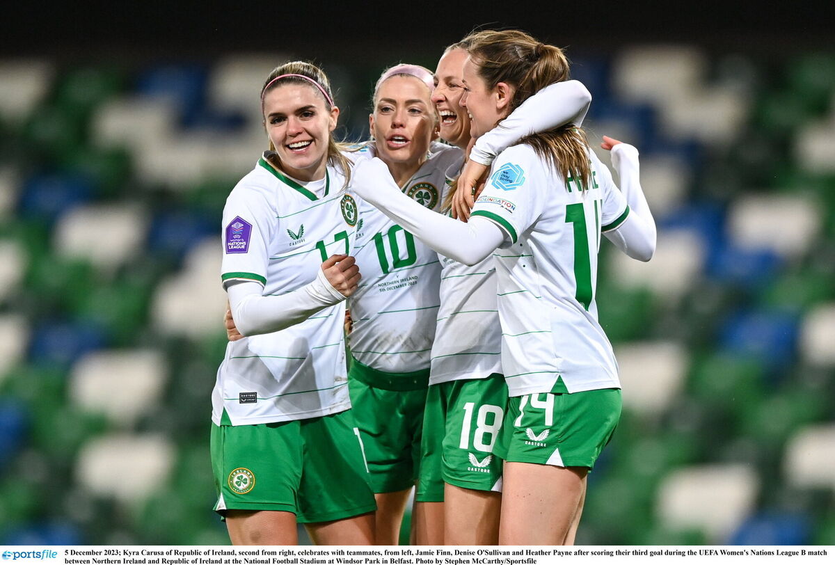 Kyra Carusa of Republic of Ireland, second from right, celebrates with teammates, from left, Jamie Finn, Denise O'Sullivan and Heather Payne after scoring their third goal during the UEFA Women's Nations League B match between Northern Ireland and Republic of Ireland at the National Football Stadium at Windsor Park in Belfast. Photo by Stephen McCarthy/Sportsfile Kyra Carusa of Republic of Ireland, second from right, celebrates with teammates, from left, Jamie Finn, Denise O'Sullivan and Heather Payne after scoring their third goal during the UEFA Women's Nations League B match between Northern Ireland and Republic of Ireland at the National Football Stadium at Windsor Park in Belfast. Photo by Stephen McCarthy/Sportsfile