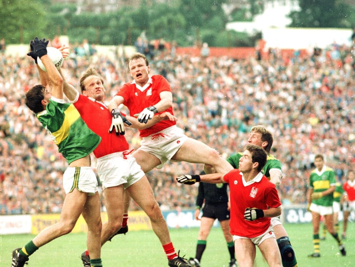 Teddy McCarthy and Colm O'Neill contest possession against Kerry's Morgan Nix in the 1988 Munster SFC final at Páirc Uí Chaoimh. 