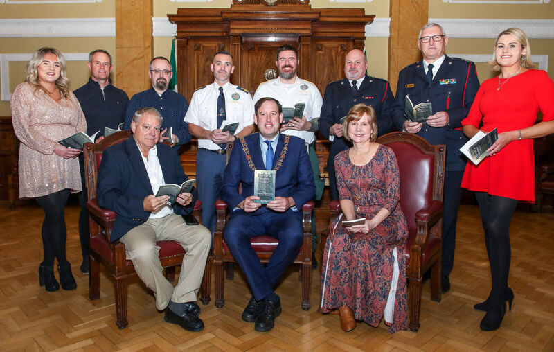   Lord Mayor of Cork, Cllr. Kieran McCarthy with author David Motte and his wife Joy at the launch of his new book 'The Gift of Blarney while visiting the City Hall in Cork. Also in Picture are the first responders who came to David's aid when he suffered a heart attack while at Blarney Castle. (L -R) Siobhan Hogan, Jeremy Downey, Kieran Staunton, Ger O'Dea, Conor Healy, Martin Coughlan, Victor Shine and Deborah Lynch. David's book recounts his dramatic rescue at the top of Blarney Castle and has returning to Cork with a special gesture for the team that saved his life. Picture: David Creedon