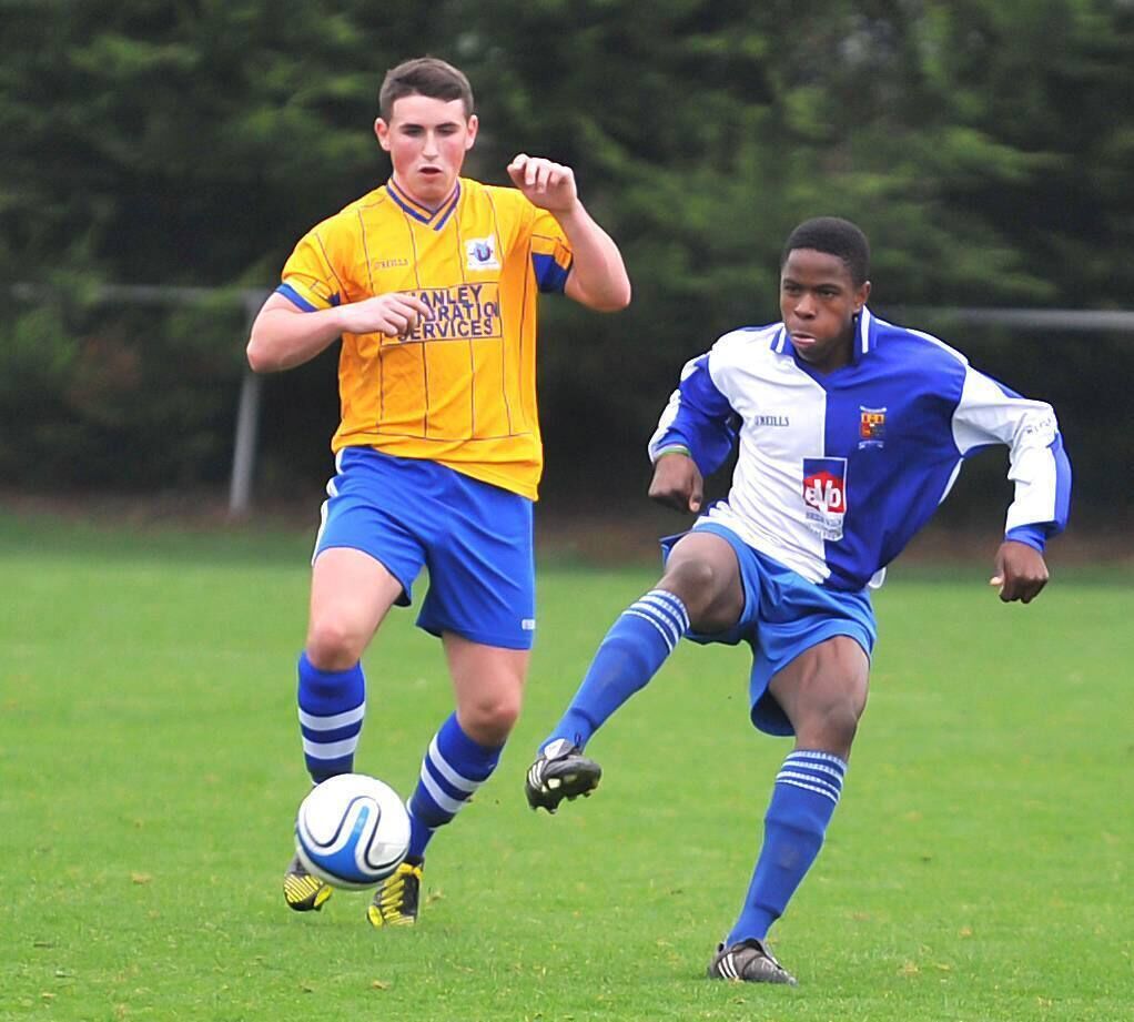 Ogbene in his playing days with College Corinthians battles with Darren Butler, Leeds. Picture: David Keane. Ogbene in his playing days with College Corinthians battles with Darren Butler, Leeds. Picture: David Keane.