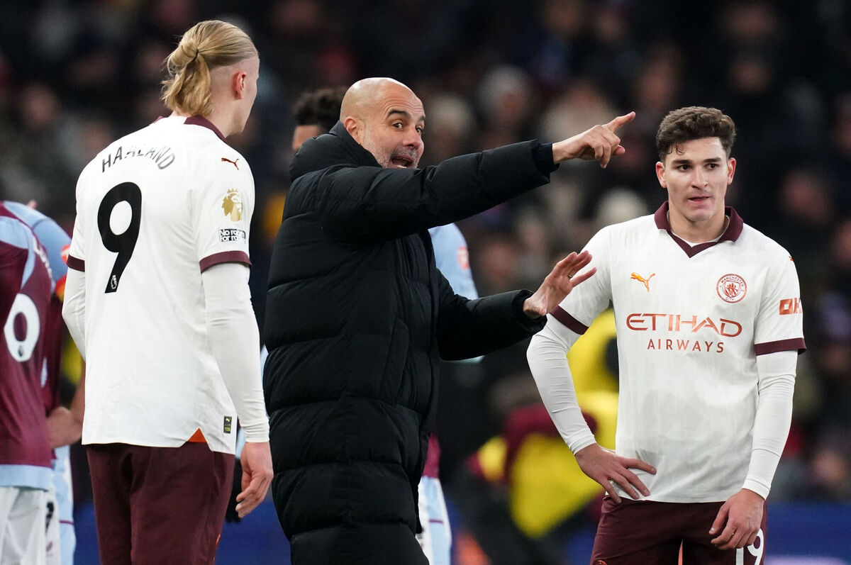Manchester City manager Pep Guardiola speaks with Erling Haaland and Julian Alvarez during the Premier League match at Villa Park, Birmingham. Picture: David Davies/PA Wire.