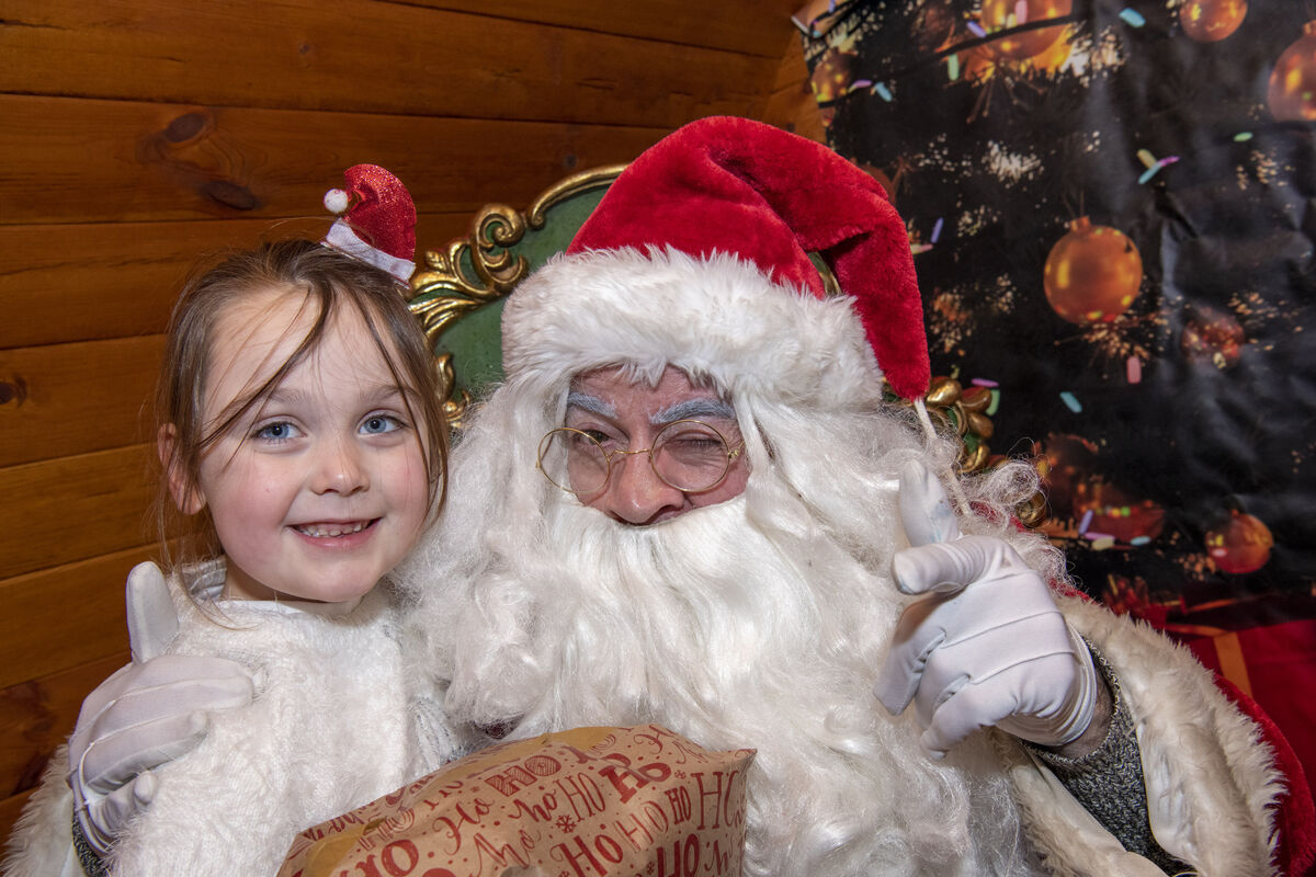 Seven-year-old Zoey O'Riordan from Ballincollig enjoying a visit to Santa. Pic: Brian Lougheed Seven-year-old Zoey O'Riordan from Ballincollig enjoying a visit to Santa. Pic: Brian Lougheed
