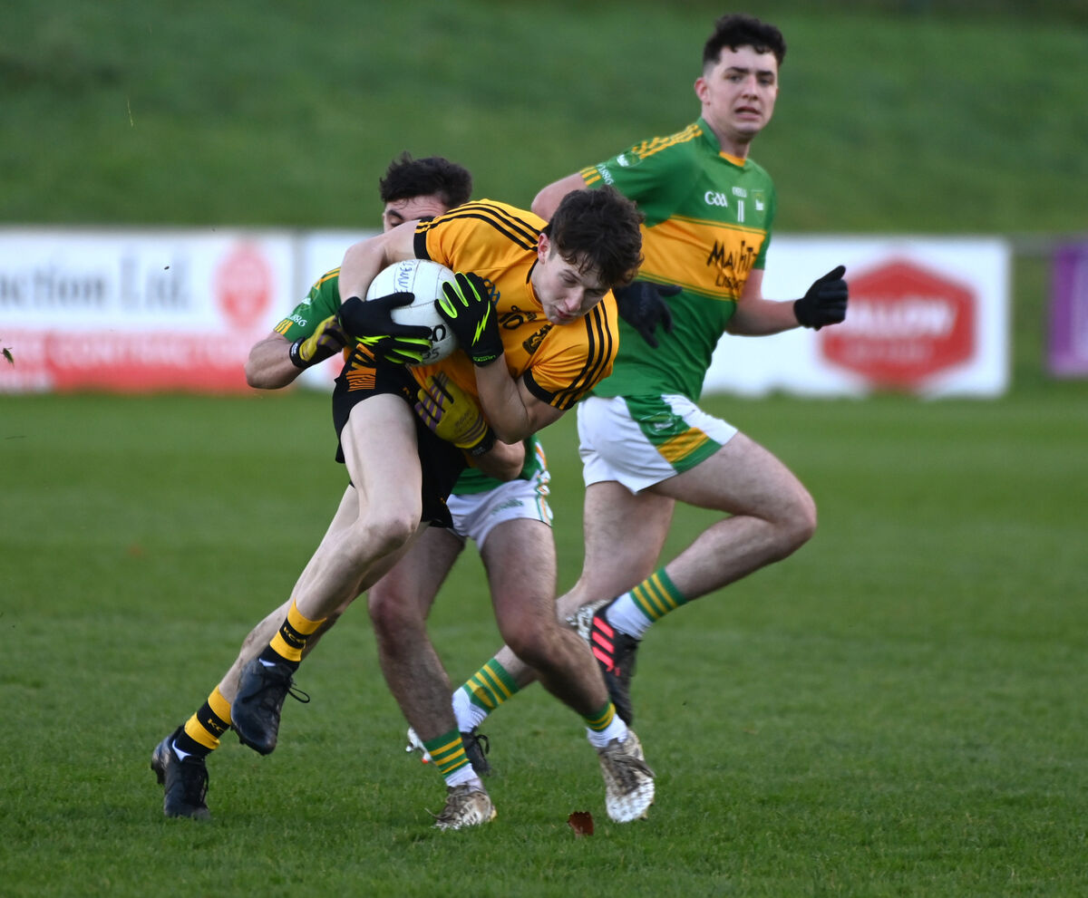 Listowel's Jack McElligott is tackled by Kilmurry's Alexander Aisling at Mallow. Picture: Eddie O'Hare