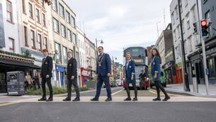 <p>Lord Mayor of Cork Cllr. Kieran McCarthy and students from Scoil Mhuire and Christian Brothers College on the revamped MacCurtain Street, enjoying the new bus stops, pedestrian crossings and public realm improvements delivered under the MacCurtain Street Public Transport Improvement Scheme. Pic: Brian Lougheed</p>