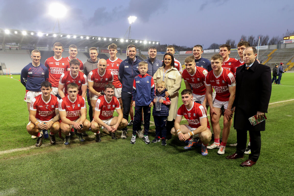 Cork team with members of the McCarthy family and Marc Sheehan, chairperson of Cork GAA. Picture: INPHO/Bryan Keane Cork team with members of the McCarthy family and Marc Sheehan, chairperson of Cork GAA. Picture: INPHO/Bryan Keane