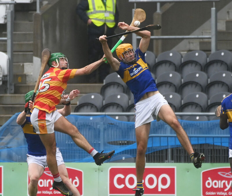 Carrigtwohill's Tomás Hogan and Newcestown's Jack Meade tussle for the sliothar during the Co-op SuperStores Cork SAHC semi-final at Páirc Uí Chaoimh. Picture: Eddie O'Hare