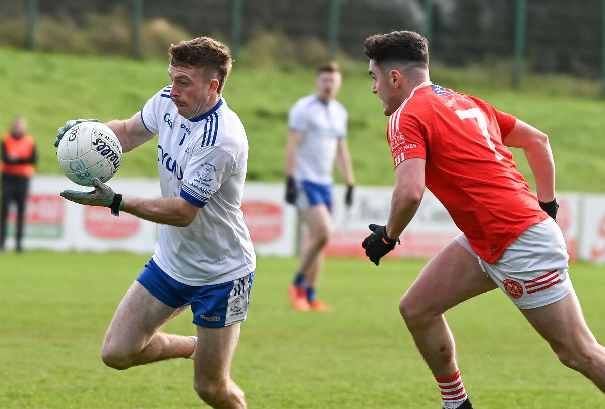  Cill na Martra's Ciaran O Duinnin breaks past Mungret's James Garvey, during their AIB Munster Club Intermediate Football Championship Final, at Mallow.