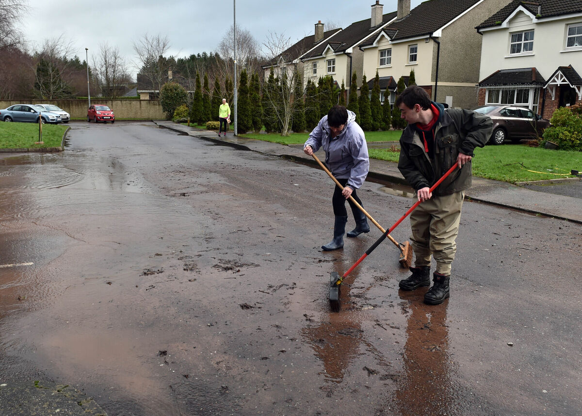 Residents cleaning up after flooding at Cooper Valley Vue in Glanmire earlier this year. Residents cleaning up after flooding at Cooper Valley Vue in Glanmire earlier this year.