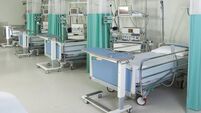 Empty beds in a hospital or surgical recovery room