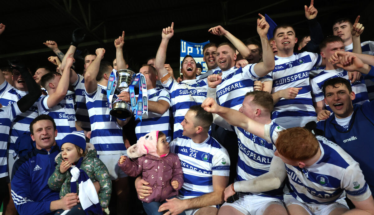 Castlehaven celebrate last Sunday's AIB Munster Club SFC final win over Dingle. The Haven originally wore white and, when they purchased their next set and white wasn't available, blue and white hoops were the most affordable option. Picture: Inpho/James Crombie