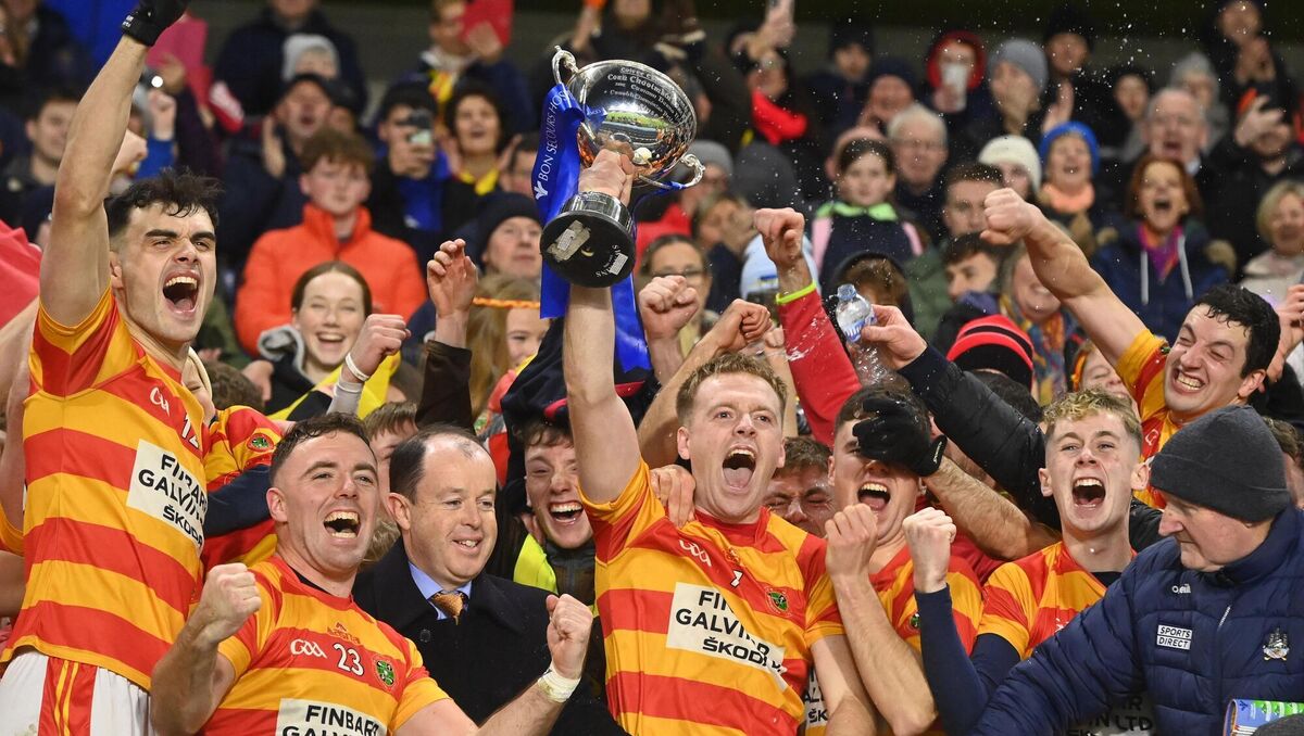 Newcestown captain Luke Meade raises the Kevin McTernan Cup after defeating Dohenys in the Bon Secours Hospital Cork SAFC final in November. When formed in 1958, Newcestown chose red and gold hoops from the point of view of uniqueness. Picture: Eddie O'Hare