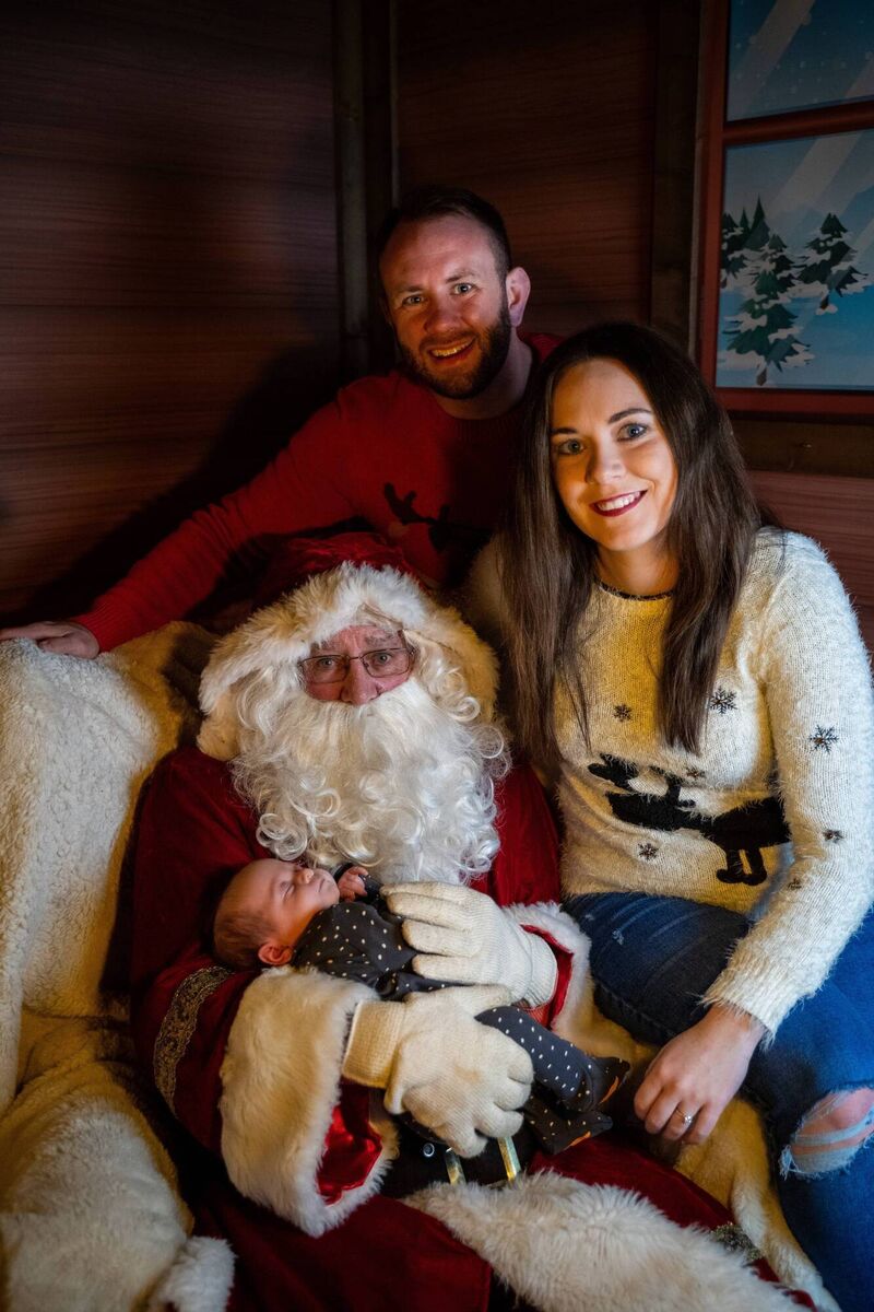 Four week old baby Emily meets the big man for the very first time with mum and dad, David and Katie O’Driscoll at an extra special fly in visit by Santa to the Marina market. Picture: Chani Anderson @capturesbychani Four week old baby Emily meets the big man for the very first time with mum and dad, David and Katie O’Driscoll at an extra special fly in visit by Santa to the Marina market. Picture: Chani Anderson @capturesbychani