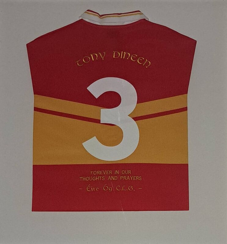 A framed Éire Óg jersey with Tony Dineen's name on the back which was presented to the Dineen family by Éire Óg in 2014.