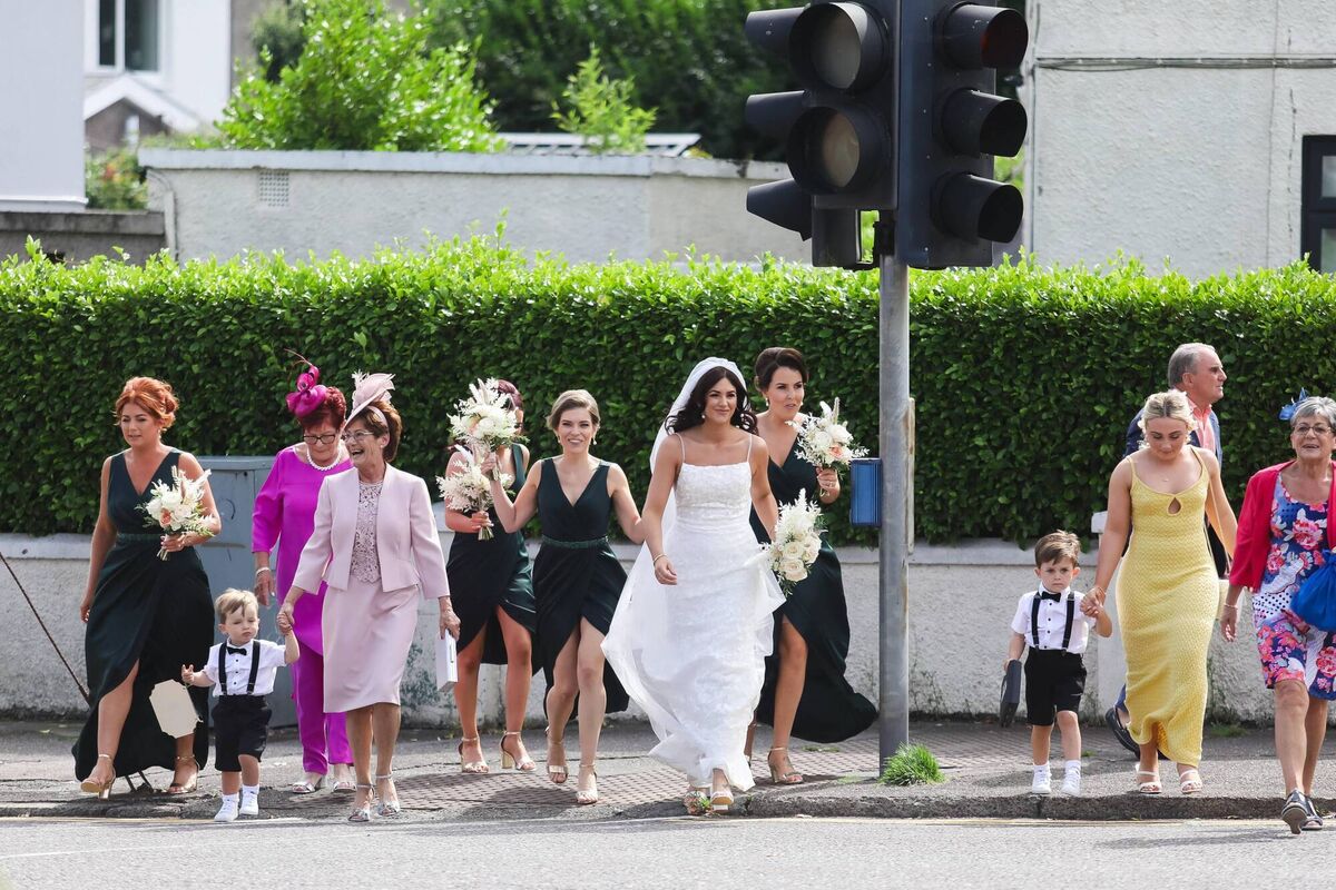 Emma and family walking from her mom’s house to the church - like she had done on her communion and confirmation days too. Emma and family walking from her mom’s house to the church - like she had done on her communion and confirmation days too.