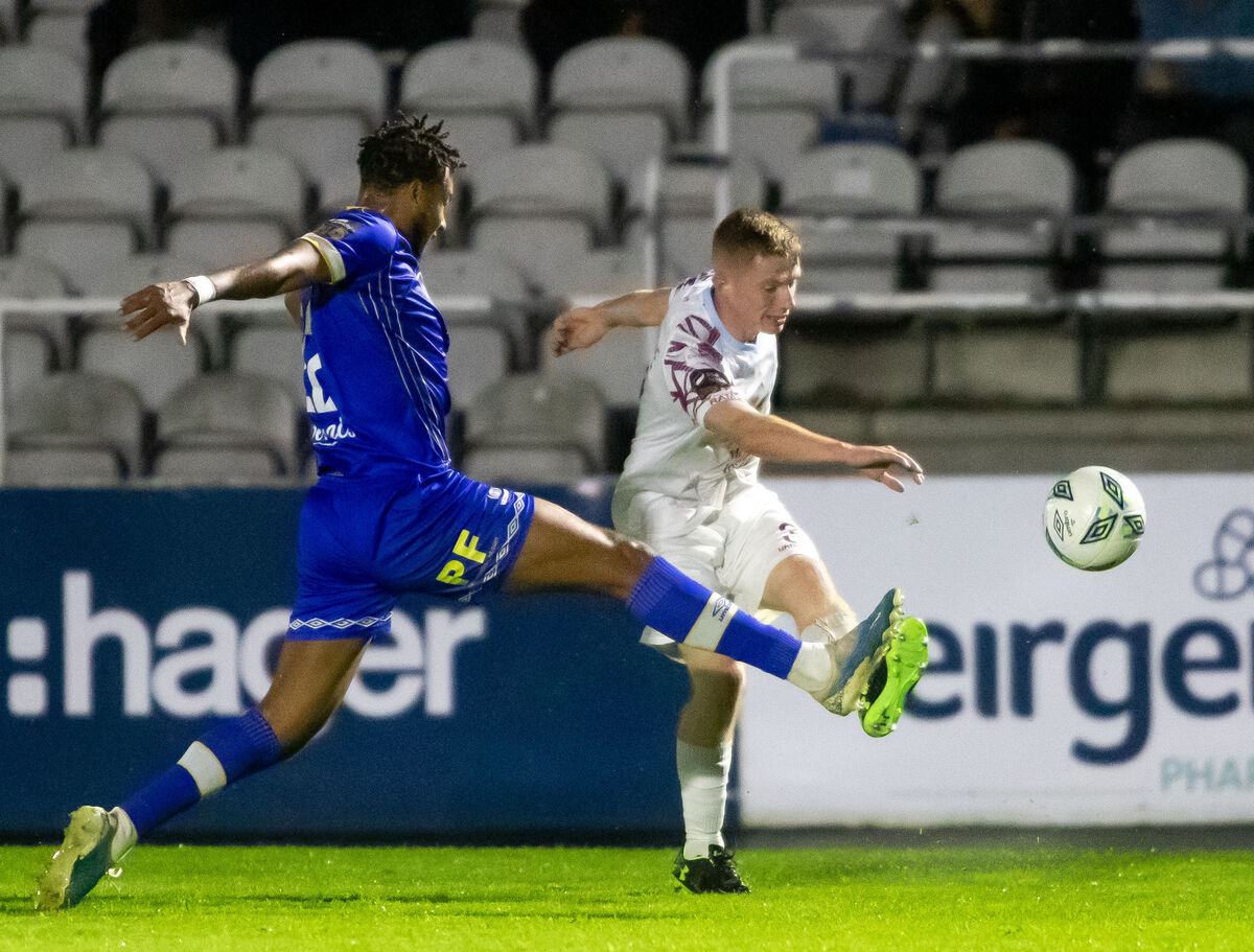 Cobh Ramblers' Cian Browne shoots past Waterford's Giles Phillips in their playoff final this year. Picture; Mary Browne Cobh Ramblers' Cian Browne shoots past Waterford's Giles Phillips in their playoff final this year. Picture; Mary Browne