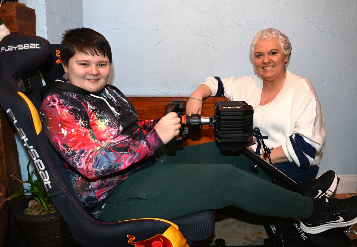 14 year old Stephen in the driving seat for an X-Box driving game with mum Karen O'Mahony of The Rainbow Club. Picture: Larry Cummins 14 year old Stephen in the driving seat for an X-Box driving game with mum Karen O'Mahony of The Rainbow Club. Picture: Larry Cummins