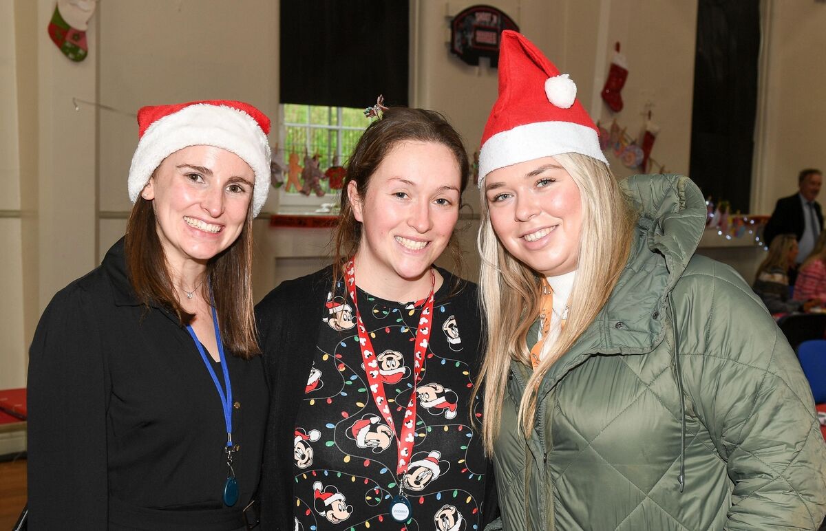  Teachers Jill Kelly and Laura O'Farrell and SNA Katie Kelly-O'Shea, are all smiles at the North Mon primary school Christmas Dinner. Picture: David Keane.