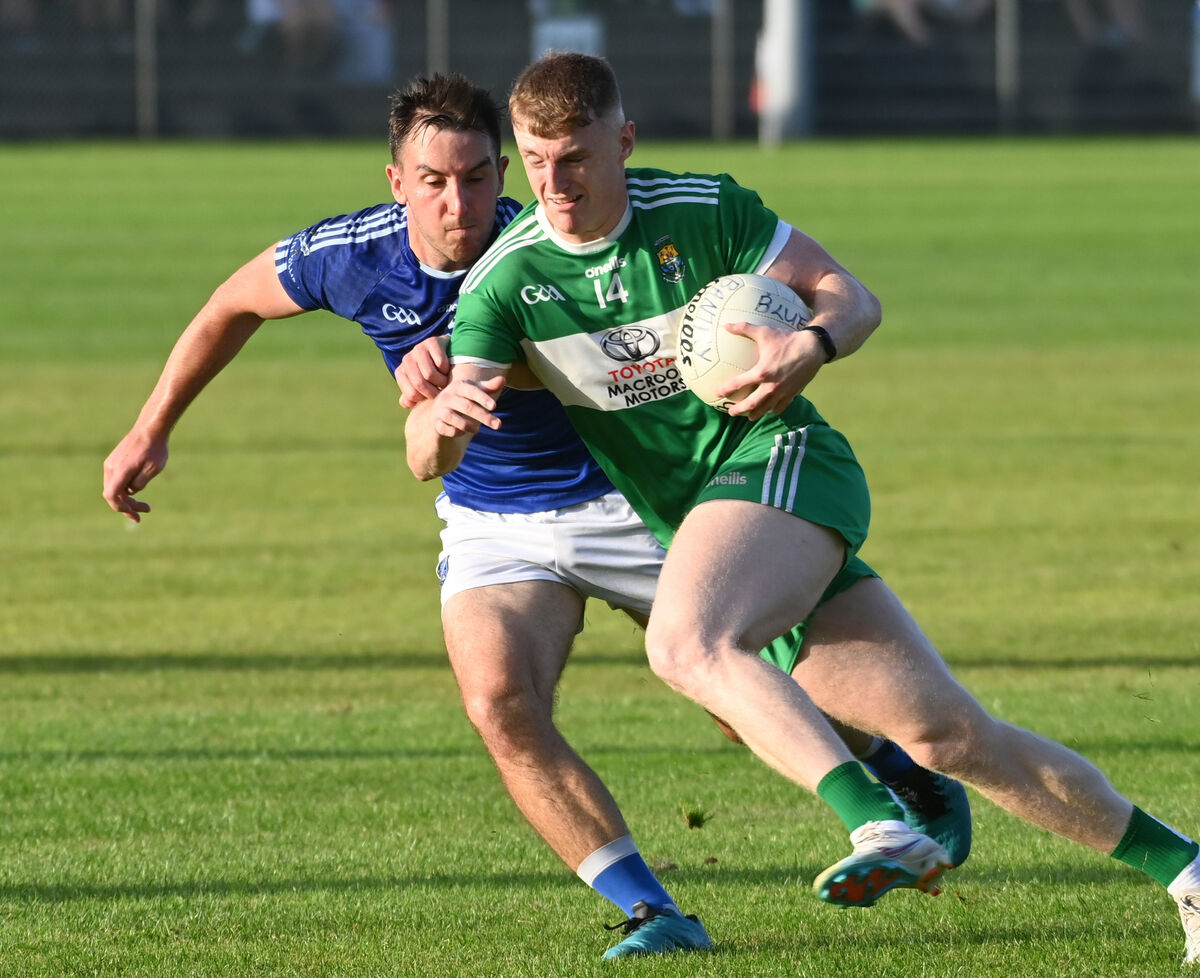 Macroom's Alan Quinn takes on Bantry Blues' Billy Foley. Picture: Eddie O'Hare Macroom's Alan Quinn takes on Bantry Blues' Billy Foley. Picture: Eddie O'Hare
