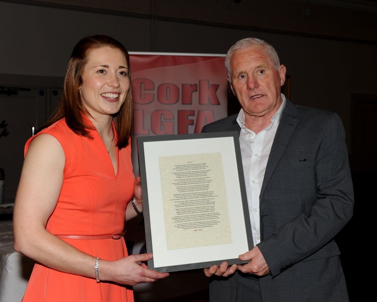 Rena Buckley presenting Eamonn Ryan with a special poem written by members of the Cork ladies football team about what he meant to them during his 11 years at the helm. Rena Buckley presenting Eamonn Ryan with a special poem written by members of the Cork ladies football team about what he meant to them during his 11 years at the helm.