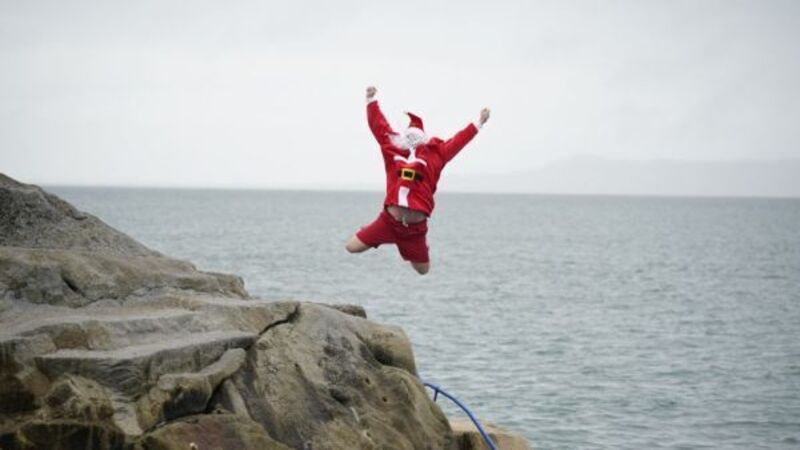 Huge crowds flock to Dublin’s Forty Foot for Christmas Day swim