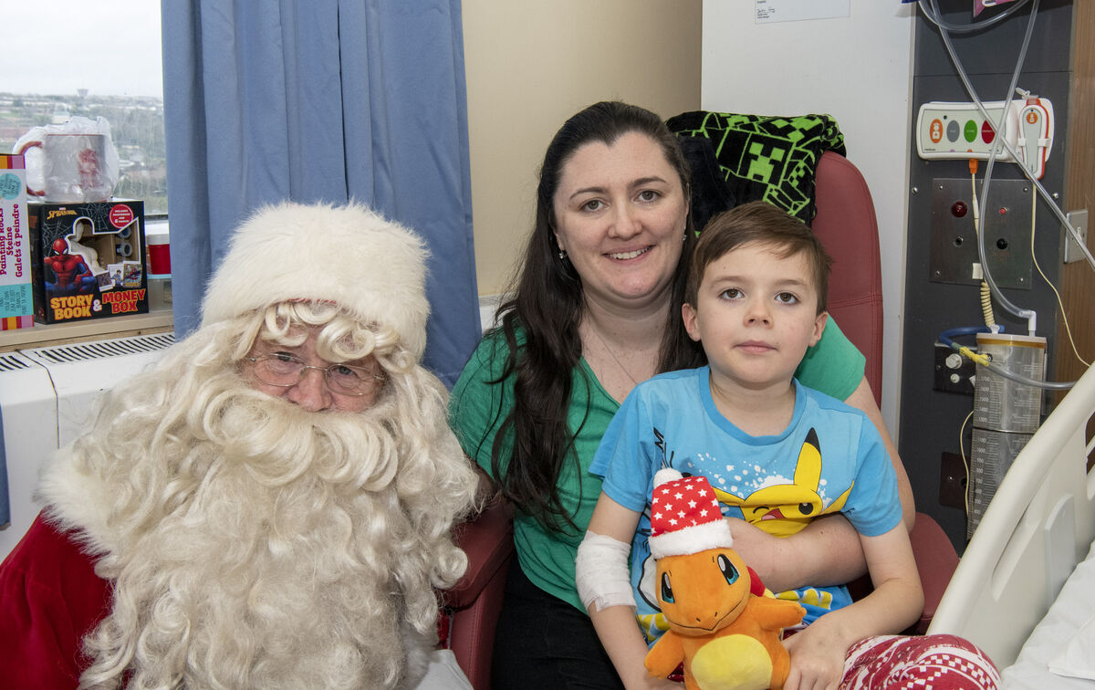 Pictured with Santa is seven-year-old Harry Buckley and mum Frances from Coachford.
