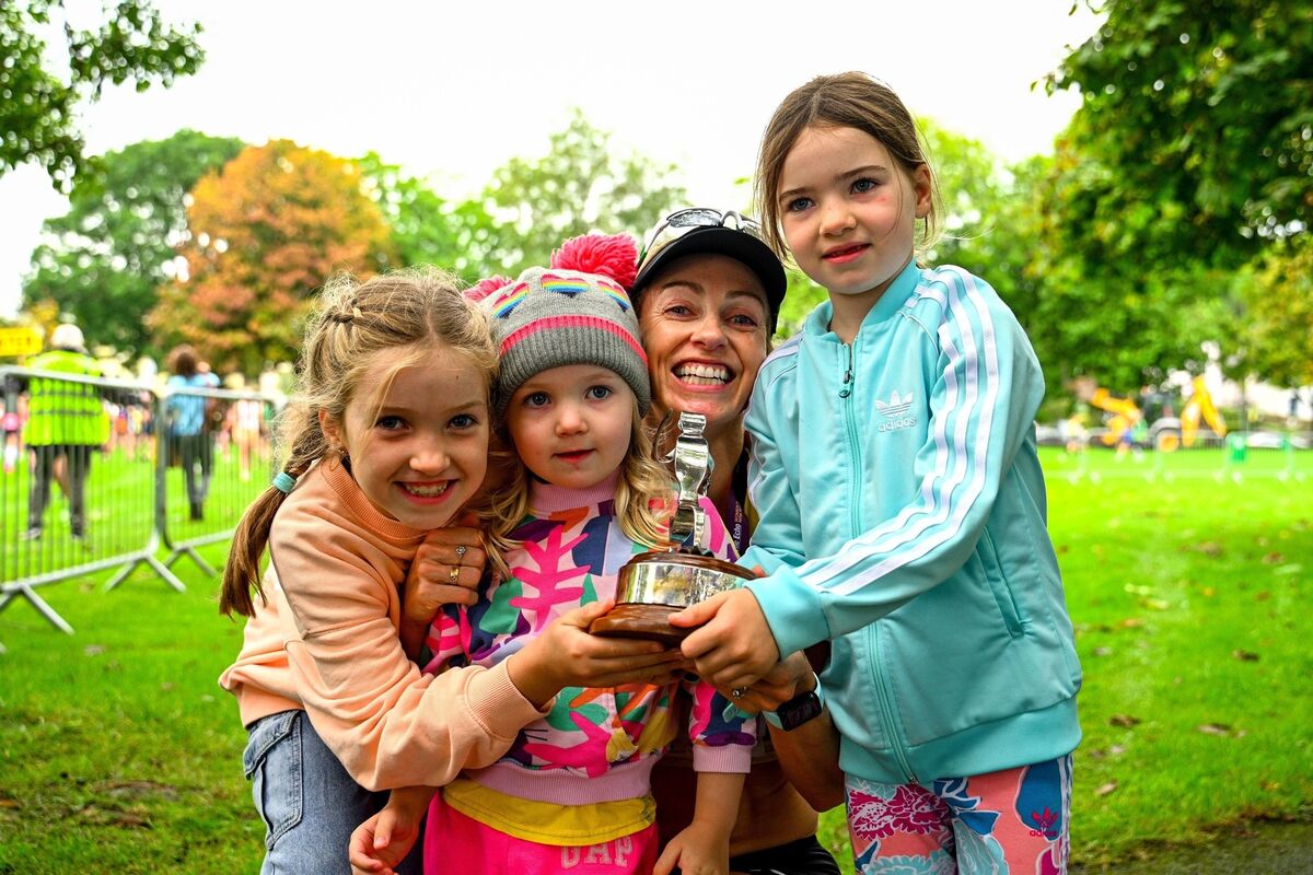 Lizzie Lee, Olympian and winner of the 2023 Echo Women's mini marathon pictured with her daughters, Jessica (3), Lucy (9) and Allison (6). Lizzie last won the marathon 10 years ago before the birth of Lucy but was determined to do it again to prove to her girls that anything is possible if you put your mind to it. Picture by Chani Anderson Lizzie Lee, Olympian and winner of the 2023 Echo Women's mini marathon pictured with her daughters, Jessica (3), Lucy (9) and Allison (6). Lizzie last won the marathon 10 years ago before the birth of Lucy but was determined to do it again to prove to her girls that anything is possible if you put your mind to it. Picture by Chani Anderson