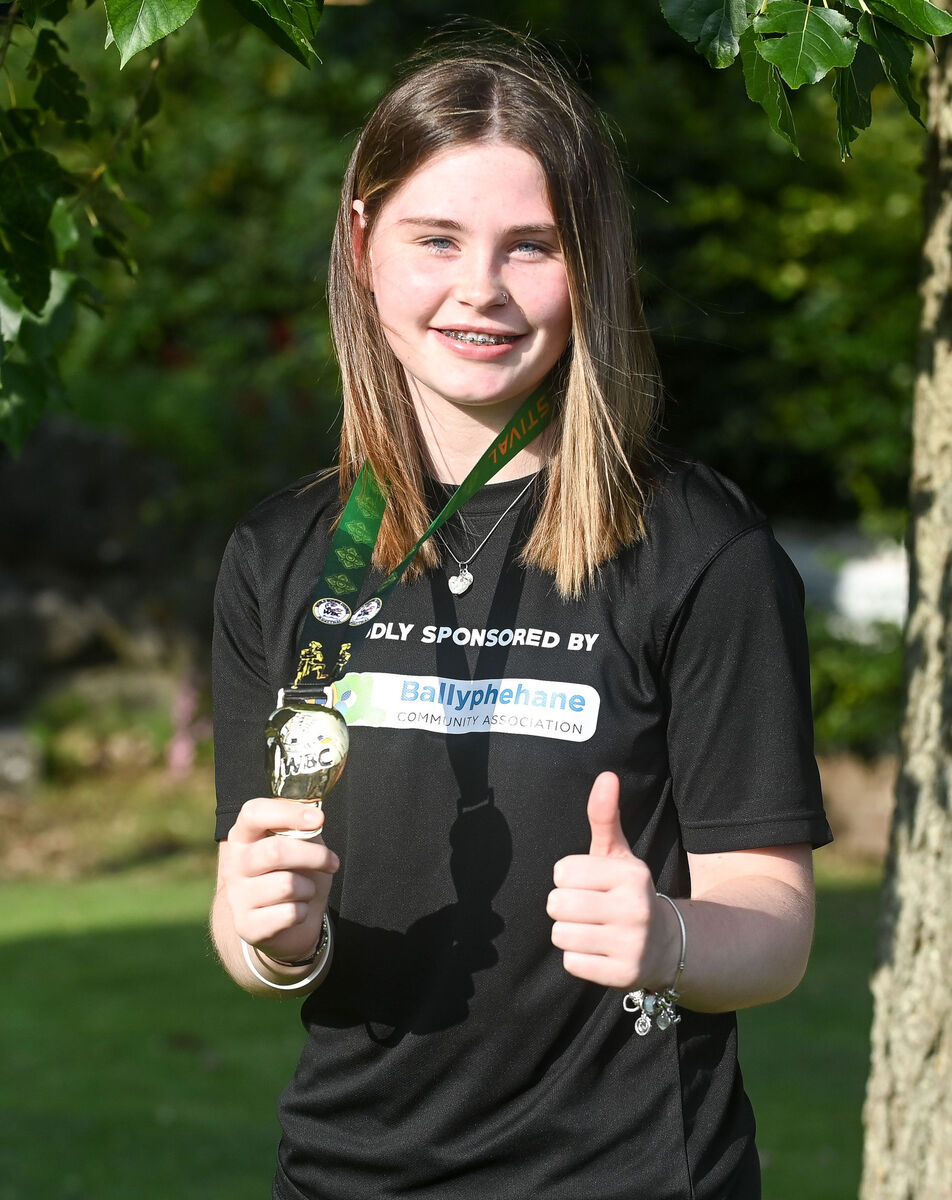 Aideen Mullins, proudly displaying her gold medal at her homecoming victory parade in Ballyphehane, after she won the WBC MuayThai world championship in Venice. Aideen Mullins, proudly displaying her gold medal at her homecoming victory parade in Ballyphehane, after she won the WBC MuayThai world championship in Venice.