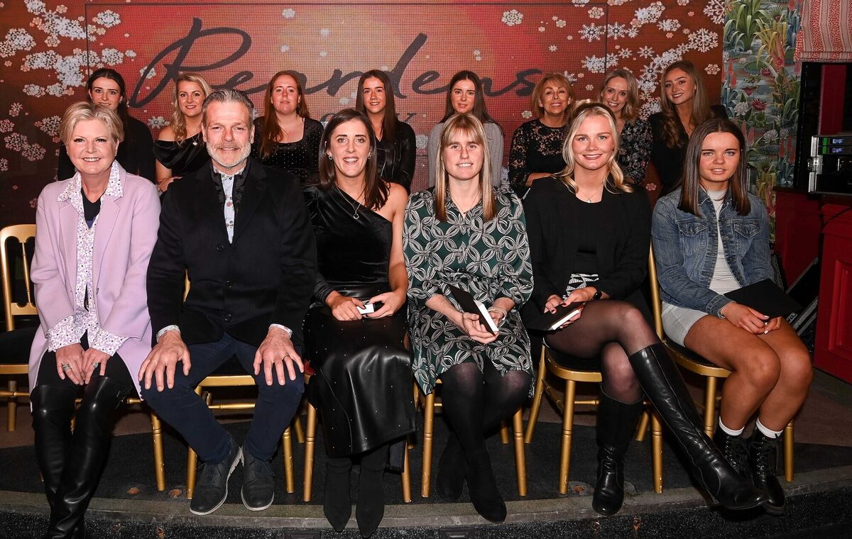  Ladies Football team players along with Reardens owner Margaret Kenneally, front left and general manager John Styles, front second left, at the Reardens All-Stars awards presentation evening on Washington Street.