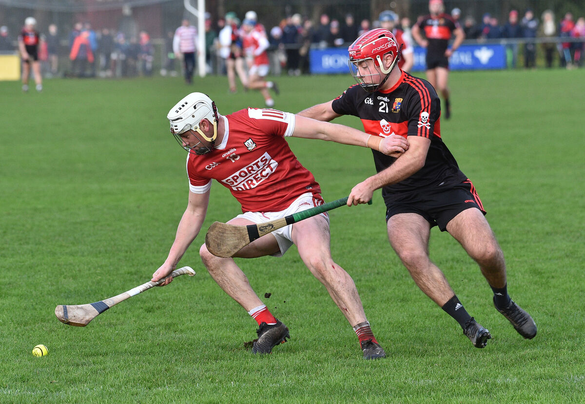  Cork's Cormac Beausang tries to gather possession despite the attentions of UCC's William Buckley in Saturday's Canon O'Brien Cup game at the Mardyke. Picture: Dan Linehan