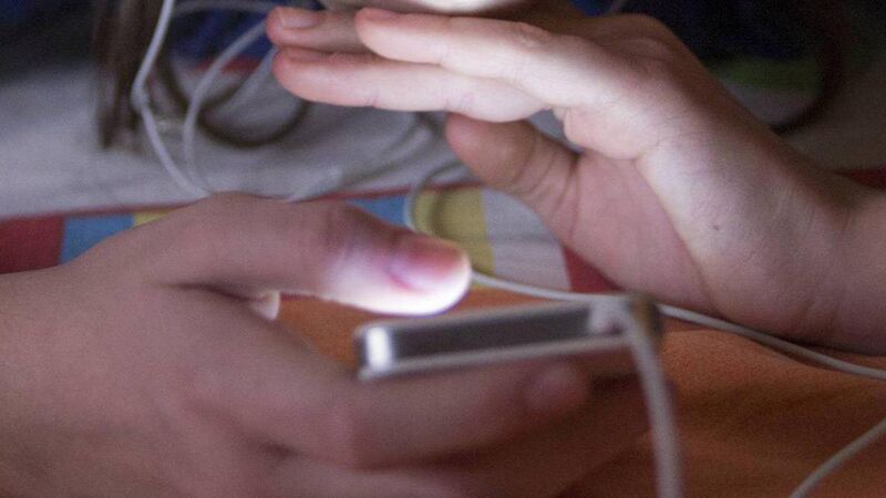 Micheál Martin says it is not feasible to ban children from social media