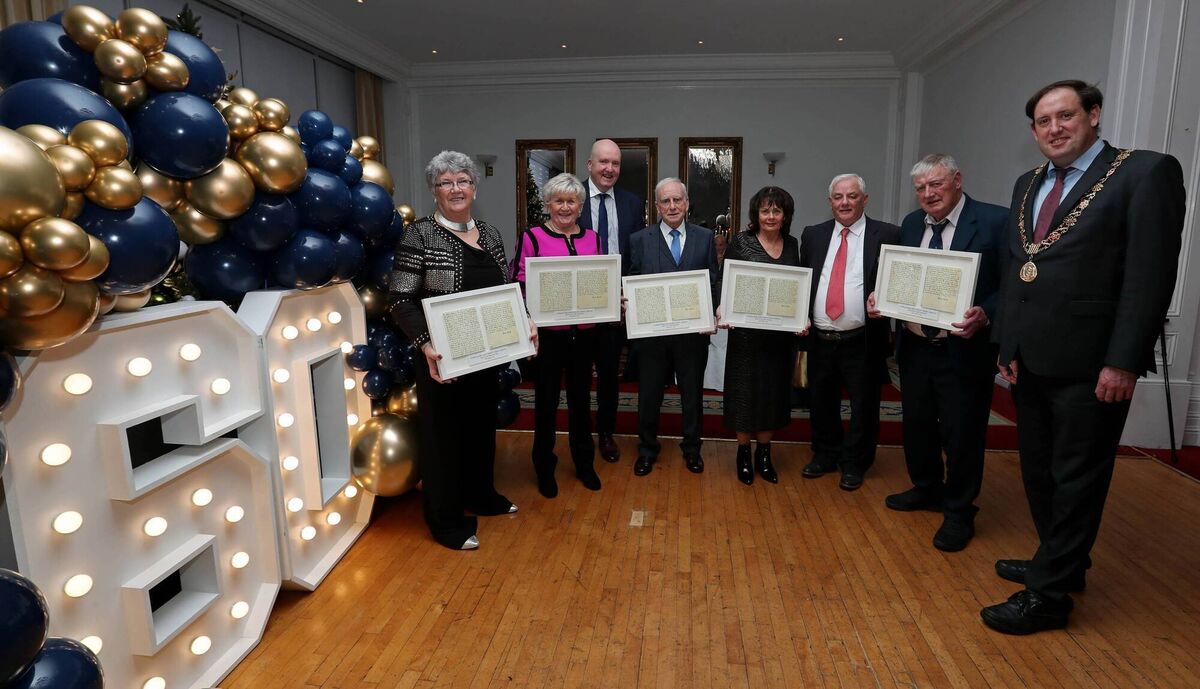 Pictured with their copy of the first Credit Union minutes are family members representing the Credit Union Founding Members are, Margaret O'Sullivan, Carmel Turnbull, Michael Mulconry, (one of the original Founding Members of the Credit Union) Joseph McCarthy, also included are Brian Neville, CEO Gurranabraher Credit Union, Michael O'Connell, Chairperson Gurranabraher Credit Union and the Lord Mayor Cllr Kieran McCarthy, at the Gurranabraher Credit Union 60th Anniversary Celebration, at the Metropole Hotel, Cork. Picture: Jim Coughlan. 