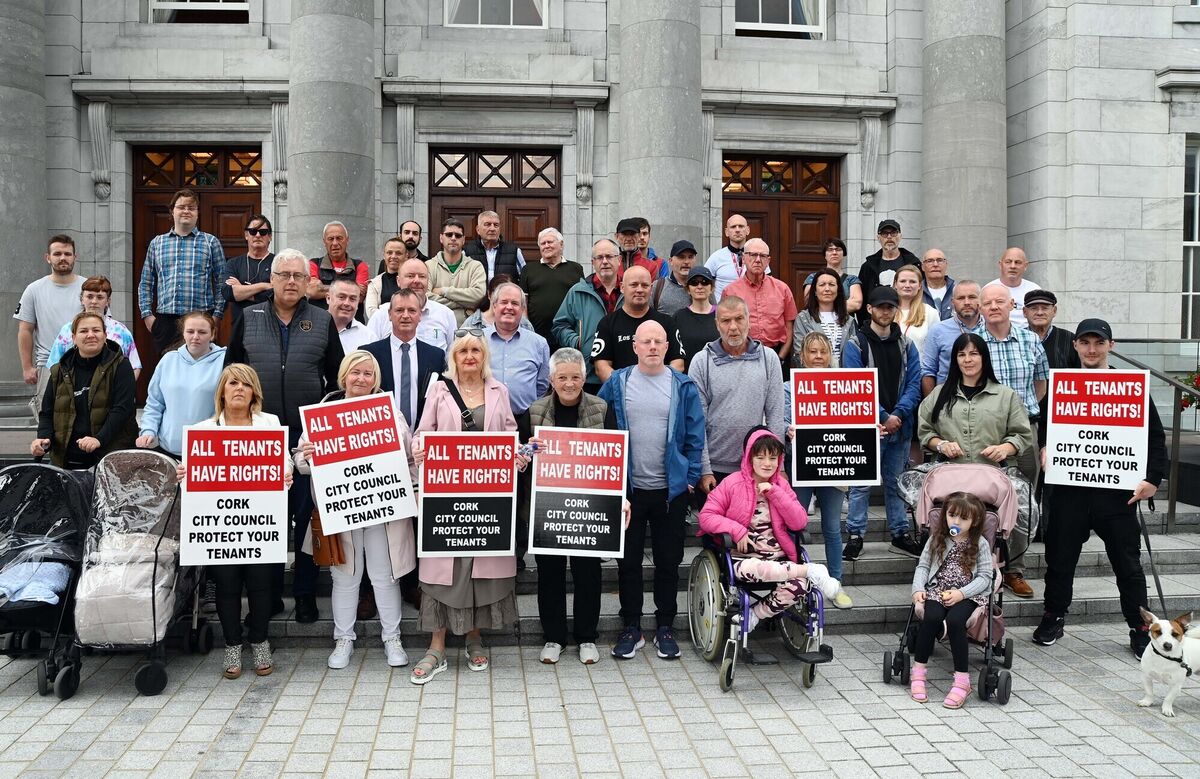 Noonan's Road Residents Committee and supporters, along with some local councillors and TDs, outside Cork City Hall during a protest about sub standard living conditions in their local authority homes. Picture: Denis Minihane. Noonan's Road Residents Committee and supporters, along with some local councillors and TDs, outside Cork City Hall during a protest about sub standard living conditions in their local authority homes. Picture: Denis Minihane.