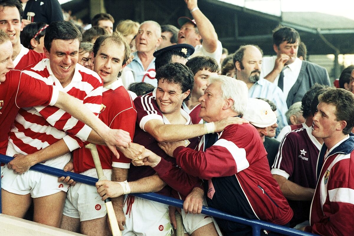 Denis Walsh celebrates with Fr Michael O'Brien and, from left, Seán O'Gorman, Mark Foley, Ger Cunningham, Brendan O'Sullivan and Anthony O'Sullivan. 