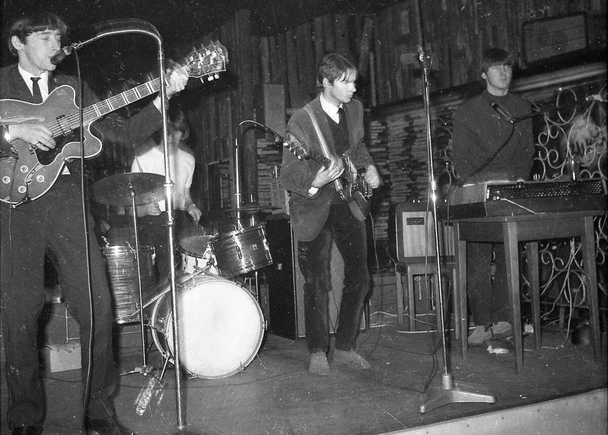 LIVING THE DREAM: Tom Cleary, Art Lorigan, Johnny Campbell, and Dave Whyte on stage in Hamburg in 1967 and (below right) the Reeperbahn in the German city in the 1960s LIVING THE DREAM: Tom Cleary, Art Lorigan, Johnny Campbell, and Dave Whyte on stage in Hamburg in 1967 and (below right) the Reeperbahn in the German city in the 1960s