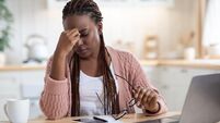 Eyes Strain. Overworked Black Freelancer Woman Tired After Using Laptop In Kitchen