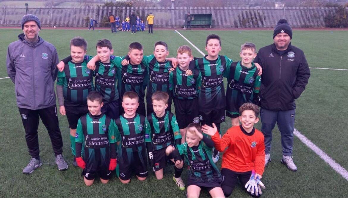 The late Jamie Wool and Darren McCarthy with their Mayfield U12 side.